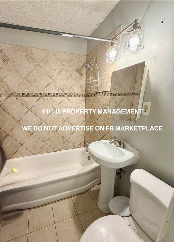 Building Photo - 4909 Woodend Ave