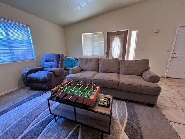 Building Photo - 3 Br 2Ba House with Garage and fenced yard**FURNISHED**