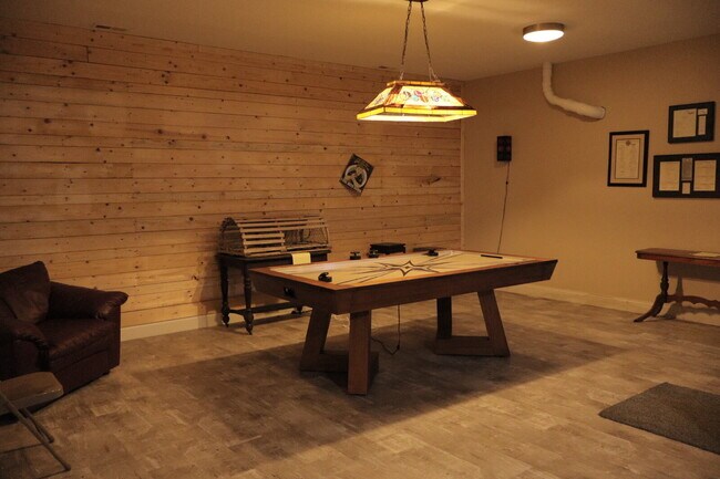 Building Photo - Expansive Mostly-Furnished Residence featuring 3 Bedrooms, a Completed Basement, and a Loft Space