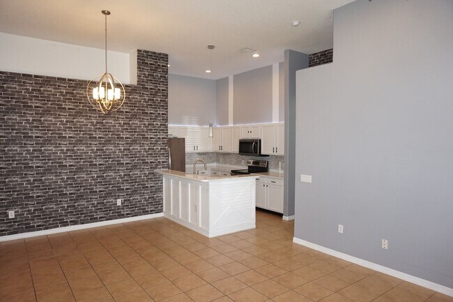 Building Photo - Designer 3/2 with 2 Car Garage in Desirabl...
