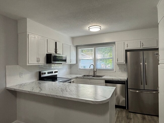 Building Photo - Renovated 3-bedroom convenient to major highways