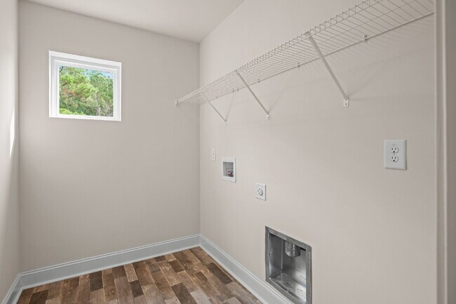 Building Photo - Spacious 4-Bedroom Retreat with 2.5 Baths ...