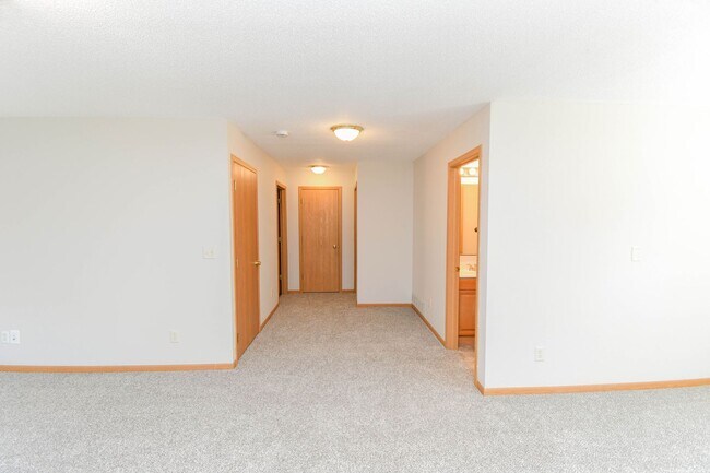 Building Photo - Updated 3BR Split-Level Home with Huge Deck, Fenced Yard & 2-Car Garage Near I-29!