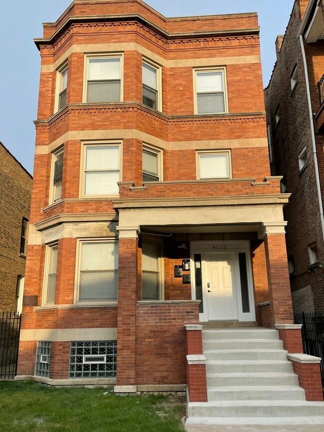 Building Photo - 6112 S Vernon Ave