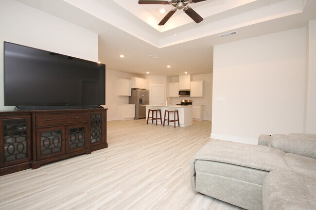 Building Photo - Don’t Miss This 4BR Avalon Home — Modern Interior, Open Floor Plan & Access to Pool, Volleyball &...