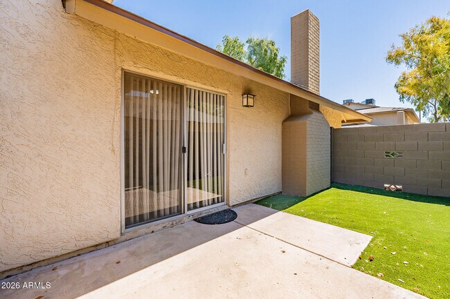 Building Photo - 1266 N 85th Pl