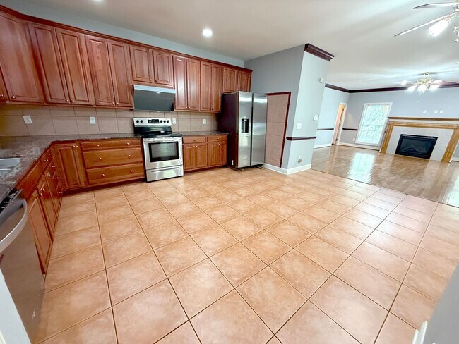 Building Photo - Beautiful Single-Family Home with Finished Basement & Fenced Backyard