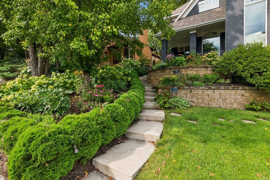 Charming curb appeal in this corner lot just a few blocks from downtown Wayzata - 745 Rice St E