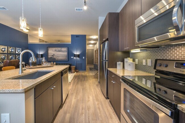 Building Photo - Modern Design Meets Everyday Luxury