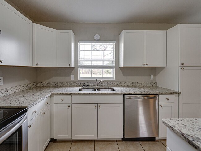 Building Photo - Discover the charm of this delightful home nestled in the serene and welcoming community of North...