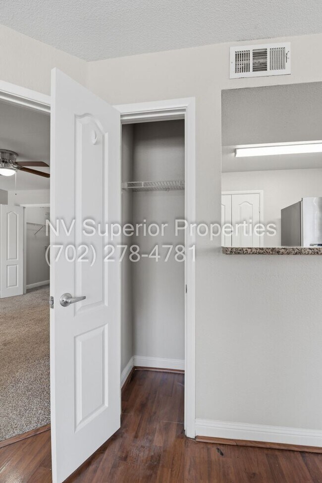 Building Photo - SW!! First floor unit with Balcony!! Gated!! Clubhouse!!  Community pool!! Spa!! Exercise Room!! ...