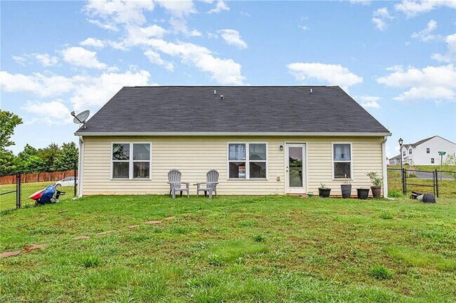 Building Photo - Earn Wealth While Leasing - Like a Homeown...