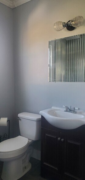 Freshly painted & new floor in bath - 131 S 7th St