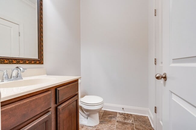 Building Photo - Welcome to this charming end unit townhome