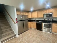 roomy eat in kitchen w/2 stainless refrigerators - 703 Washtenaw Rd