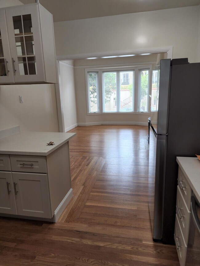 Looking from kitchen and dining area to living room - 3119 Jackson St