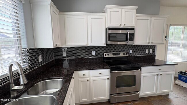 Building Photo - 5396 W Molly Ln