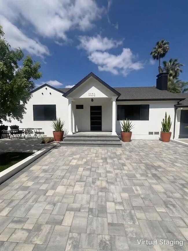 Building Photo - 7317-7321 Garden Grove Avenue