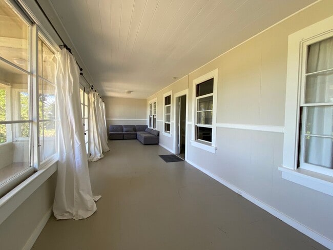 Building Photo - Furnished Plantation Home with 3 Bedrooms, 2 Bath large enclosed porch on almost 2 acres with oce...