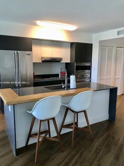 Building Photo - 9821 E Bay Harbor Dr