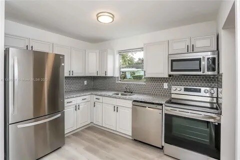 Building Photo - 4421 NW 34th Ct