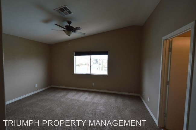 Building Photo - 8820 Spinning Wheel Ave