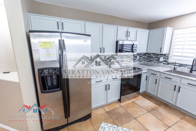 Building Photo - 10234 E Carol Ave