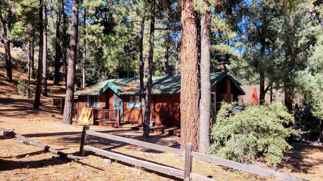 Building Photo - Move-In Ready 2-Bedroom Log Home with Wrap-Around Deck and Enclosed Yard