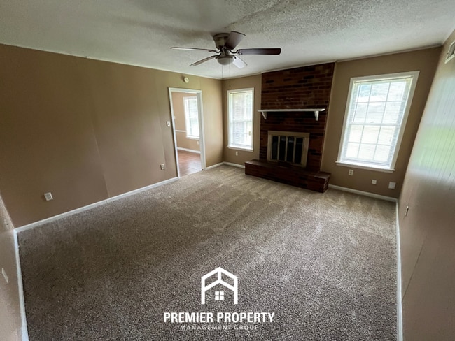 Building Photo - Spacious 4BR/2BA Whitehaven Home | 1,701 Sq Ft, Brick Fireplace & Quiet Cove