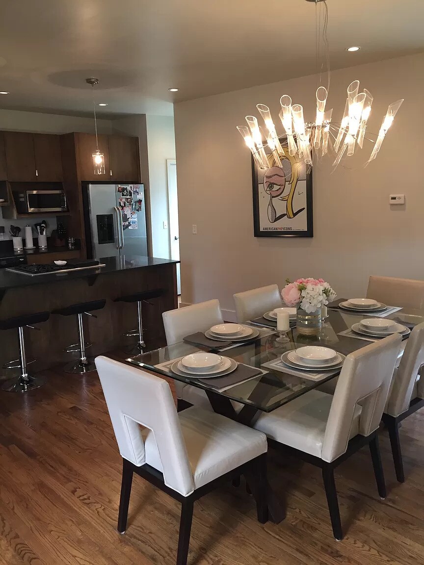 Dining area and kitchen - 1416 S Troost Ave