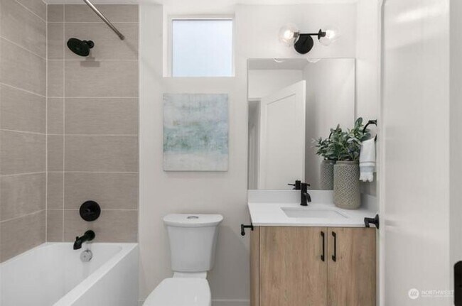 Building Photo - Welcome Home -Modern and Expansive Windows