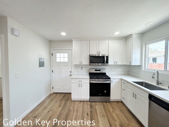 Building Photo - Welcome to your beautifully renovated sing...