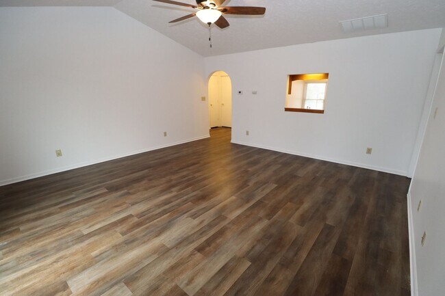 Building Photo - Discover this well-maintained 3-bedroom, 2-bath home in Indianapolis featuring an attached garage...