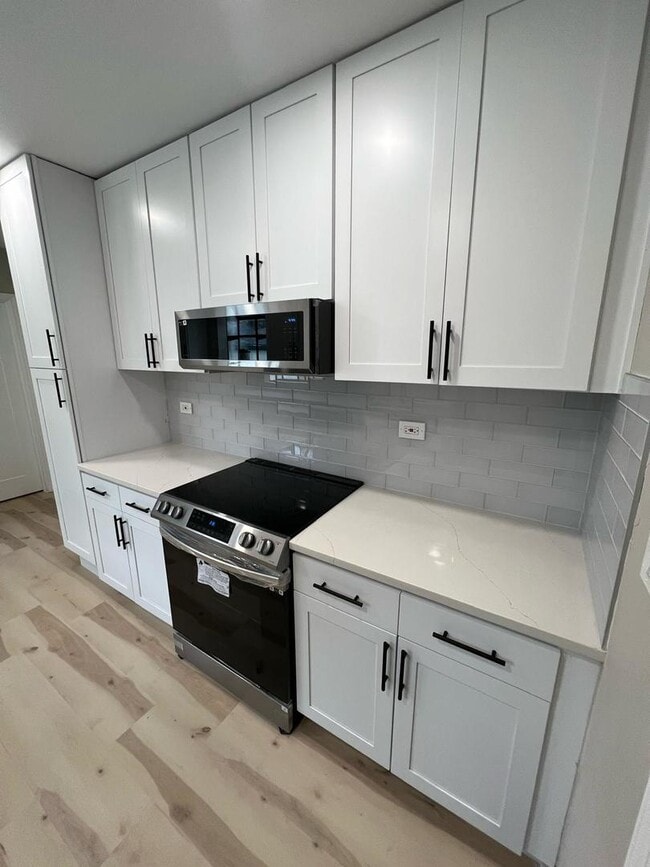 Building Photo - 4021 W Estes Ave