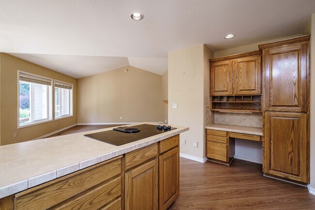Building Photo - Beautifully Landscaped 1/4 acre with Well Maintained 4 bedroom 2 Bath Home with 3 Car Garage