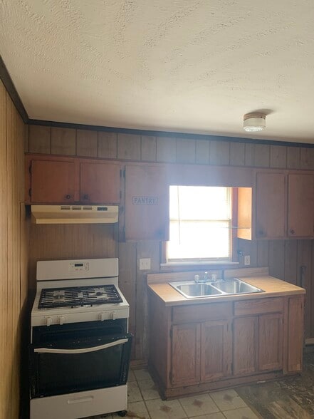 Kitchen stove and sink area - 375 Columbus St