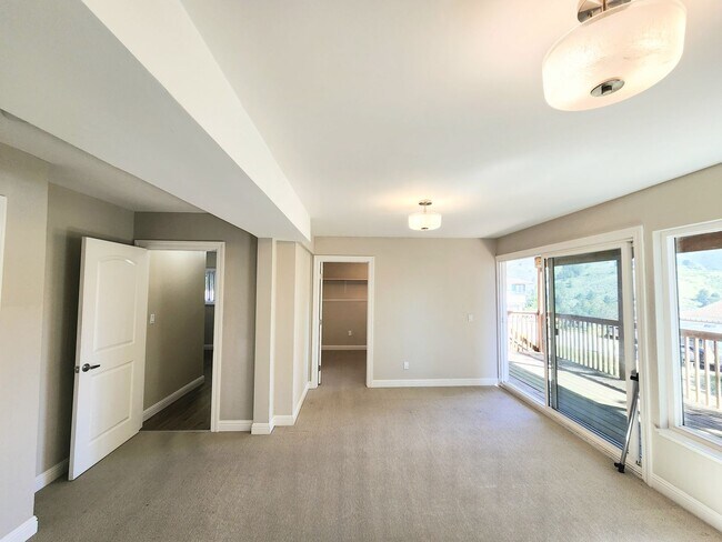 Building Photo - 3 bedroom 3 bathroom hillside Pacifica home with serene views