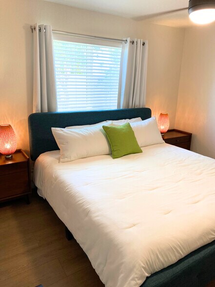 Master Bed: King size bed, 2 nightstands with USB ports, blackout wood blinds, darkening curtains. - 1795 W 28th St