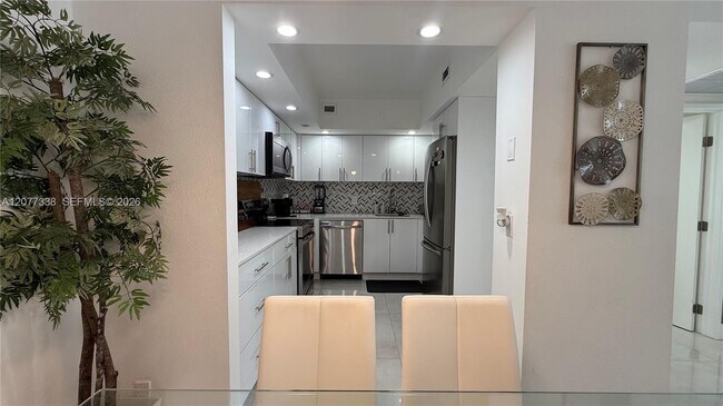 Building Photo - 5600 Collins Ave