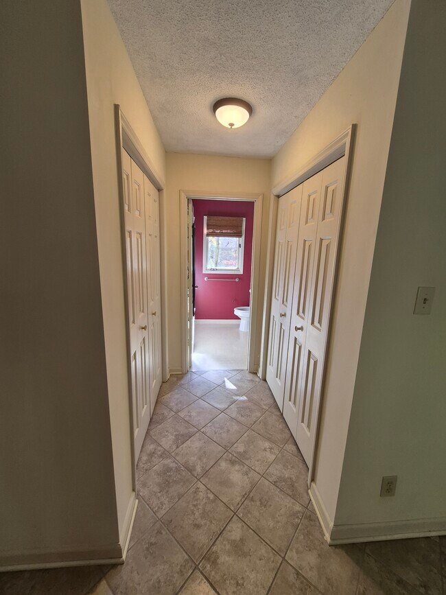 master bedroom's closets and walk to upstairs bathroom - 4422 Beechnut Ln