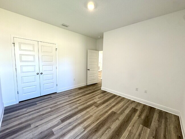 Building Photo - This gorgeous new construction home in Ward Creek overlooks a protected nature preserve.