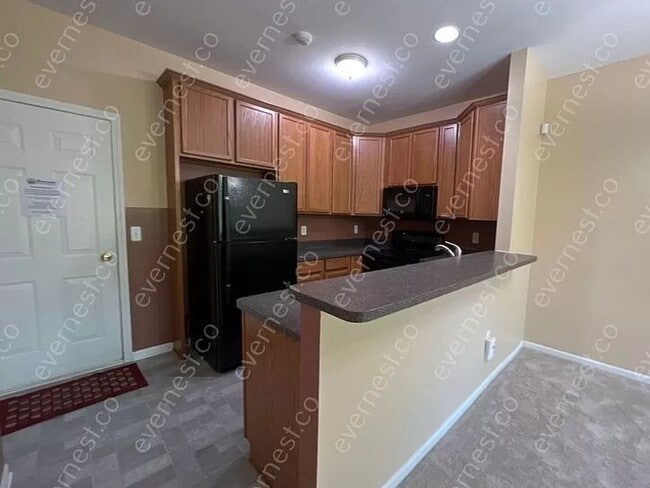 Primary Photo - 2 Bedroom Condo with loft and basement in ...