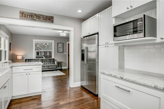 Building Photo - North End Beauty with Bonus Space & Garage!