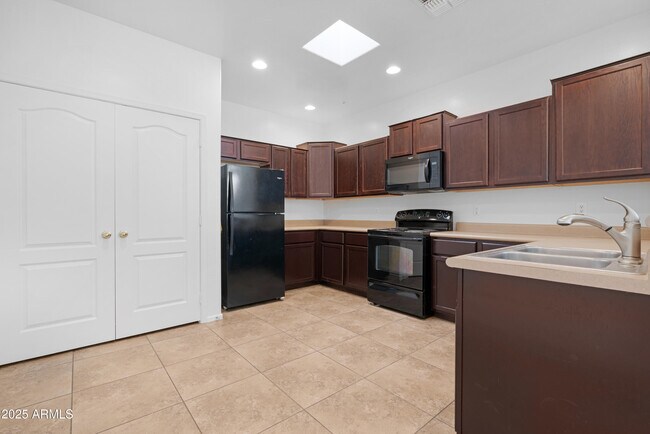 Building Photo - 8940 W Olive Ave