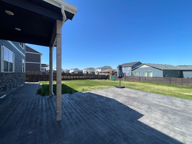 Building Photo - Live Lavishly in Harmony Ridge- Fully Furnished 5-Bedroom Dream Home with Backyard Oasis & Speake...