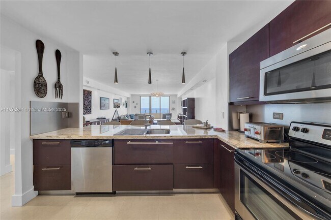 Building Photo - 5555 Collins Ave