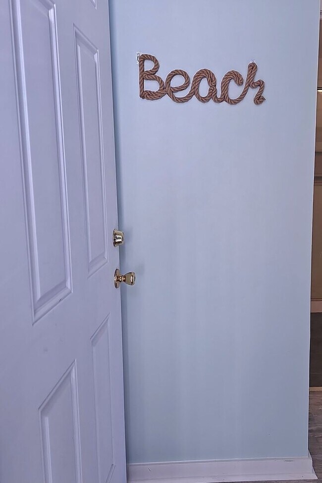 Building Photo - Dreamy Little River Condo — Furnished, Elevator Access, Pool & Marina Nearby!