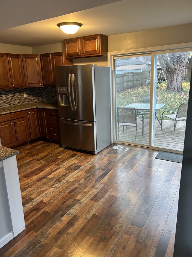 kitchen with sliding door to fenced in backyard - 310 K St