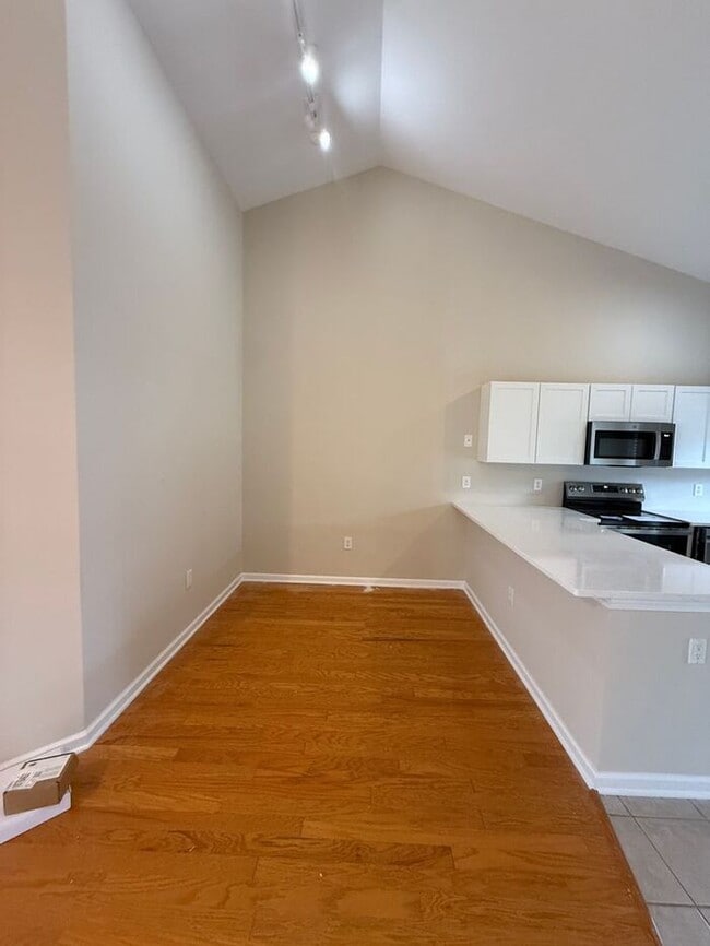 Building Photo - RENT SPECIAL! Freshly Painted! New Carpet!...