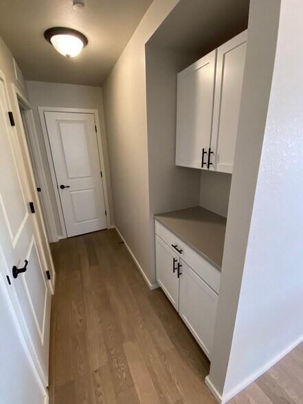 Coffee bar area and hallway to laundry and 1/2 bath - 2614 Avenger Pl #5